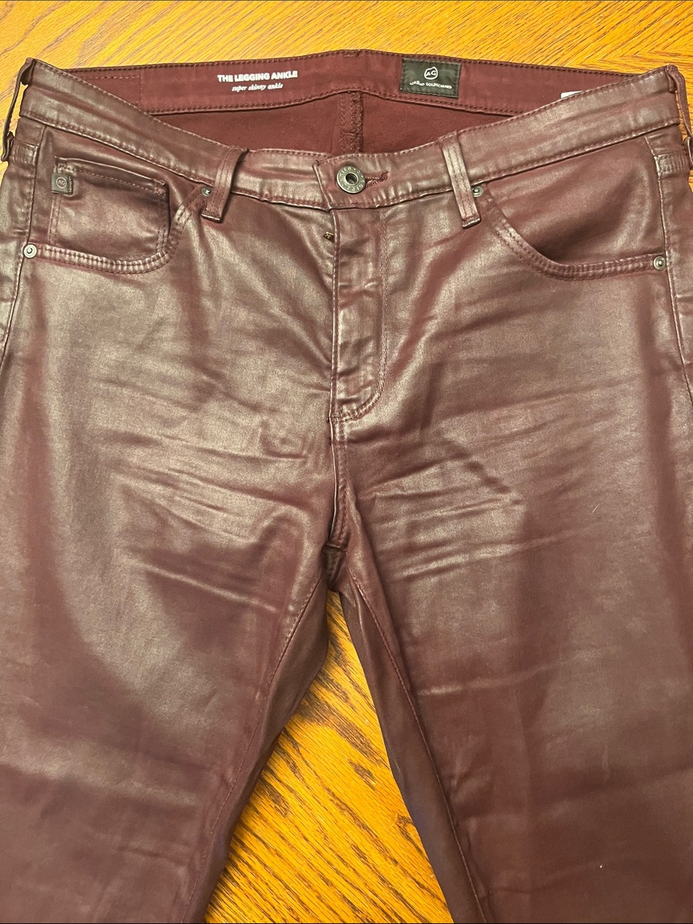 AG  Adriano Goldschmied Burgundy Coated Jeans -